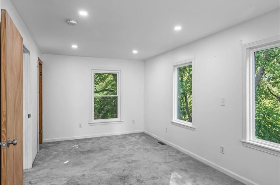 Primary bedroom facing west, functioning window. Picture windows for excellent view facing south - 600 Ridgeview Ave