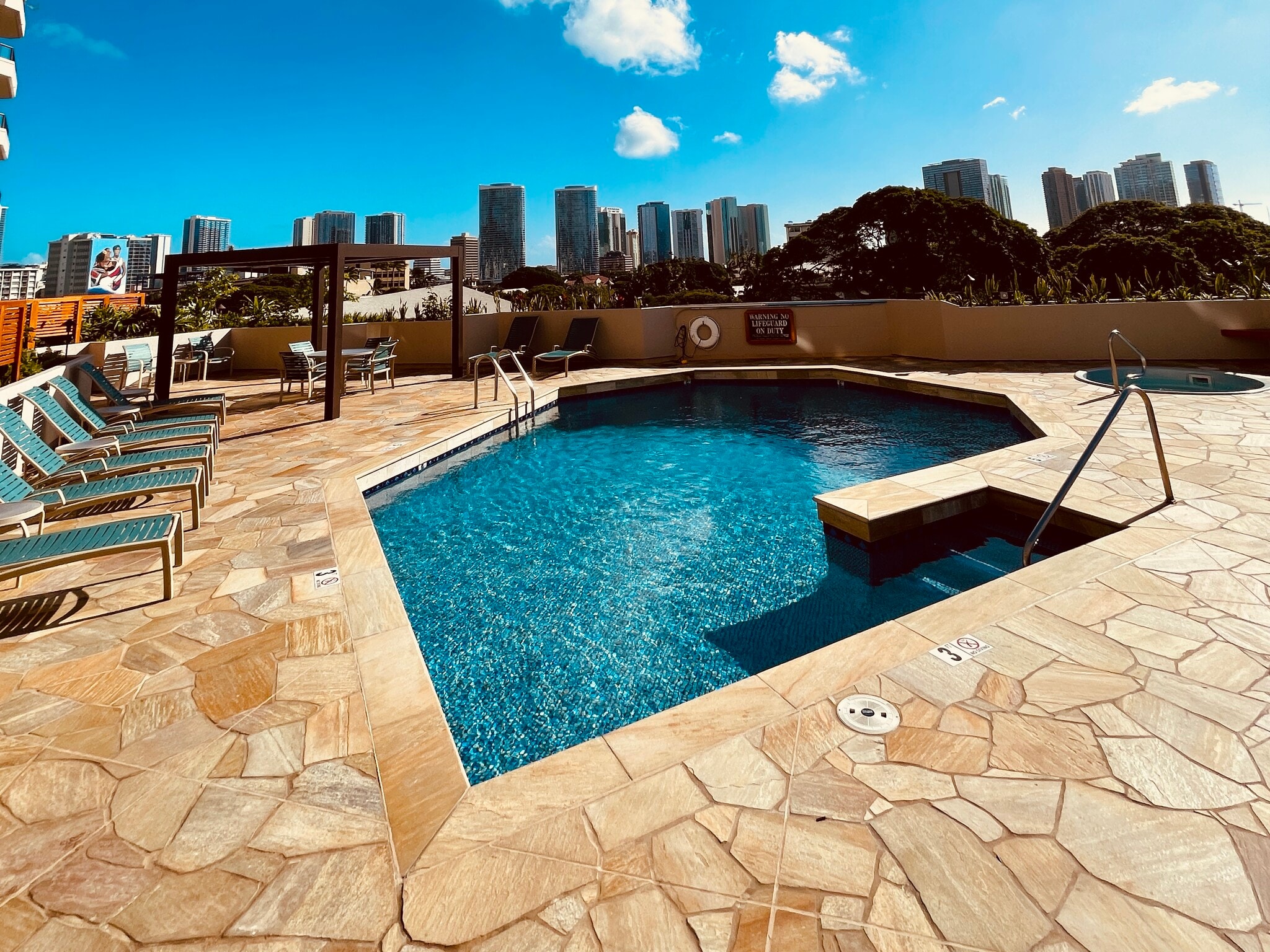 Newly tiled pool deck with jacuzzi - 1221 Victoria St
