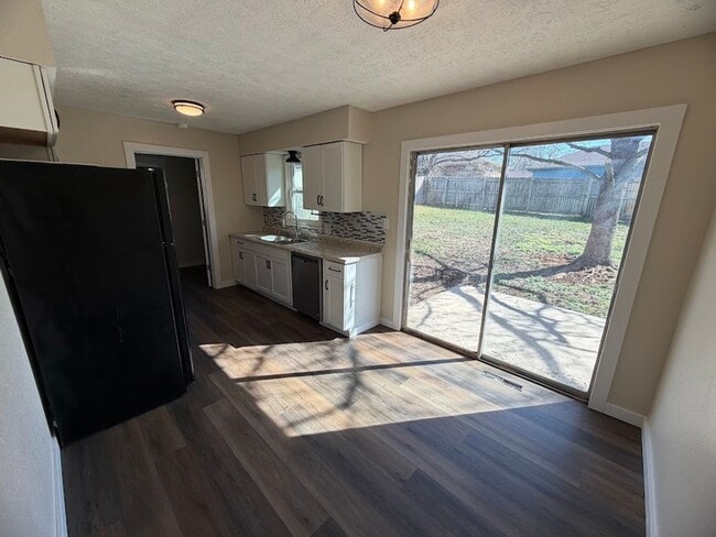 Building Photo - 3 Bedroom Home with Fenced Backyard & Storage Shed