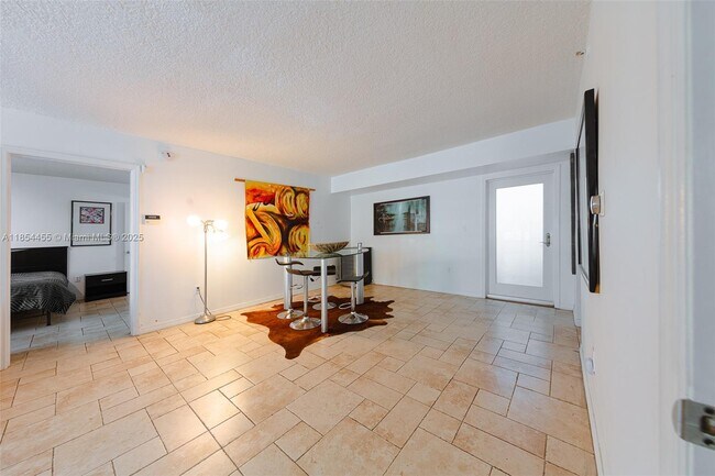 Building Photo - 7800 Collins Ave