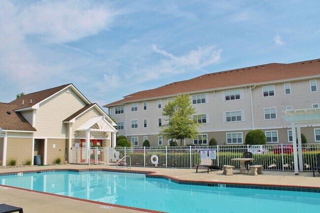 Building Photo - 2 Bedroom Condo w/Open Floor-Plan & Stainless Steel Appliances! Some Utilities Included!