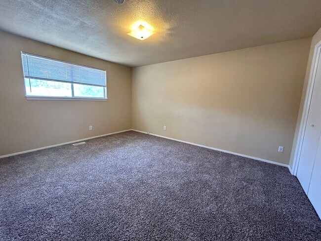 Building Photo - Corner Lot Home w/ Giant Yards, Covered Patio & Minutes to Boise Spectrum Center!