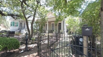 Building Photo - 2BR w/ In-Unit W/D + Assigned Parking in 70119