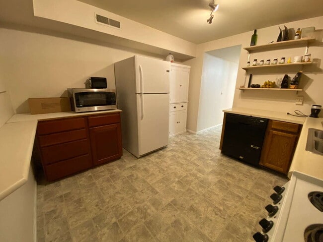 Building Photo - Downstairs Suite with Private Kitchen & Ba...