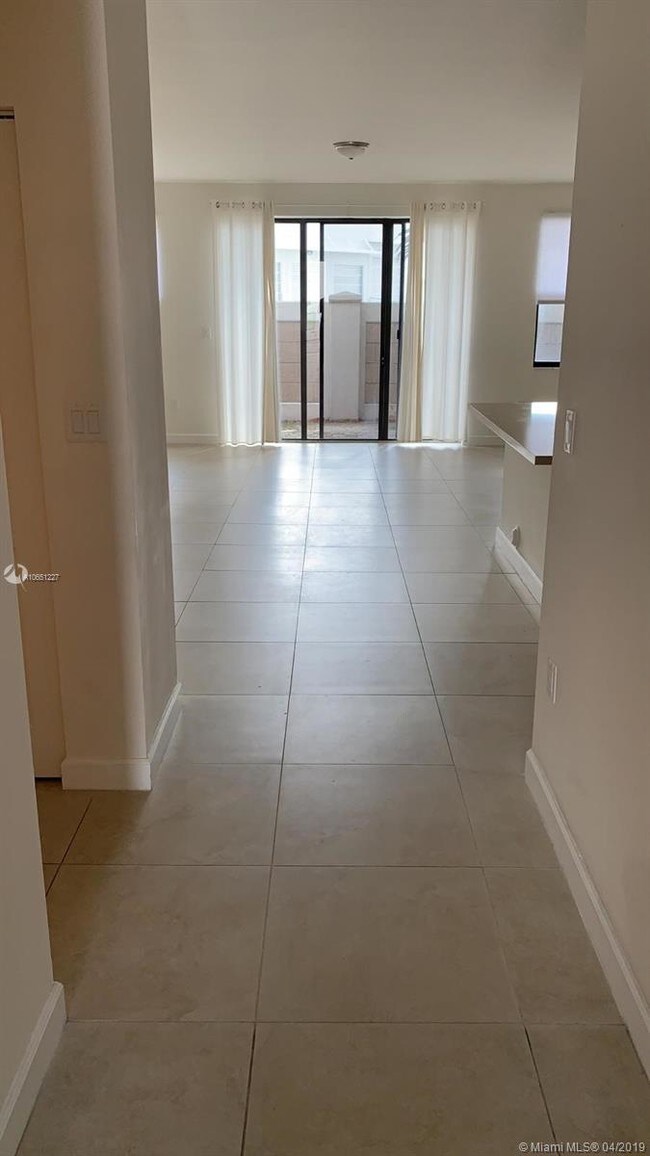 Building Photo - 6175 NW 104th Ct