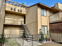 Building Photo - Upstairs  2-Bedroom 1-bath Condo