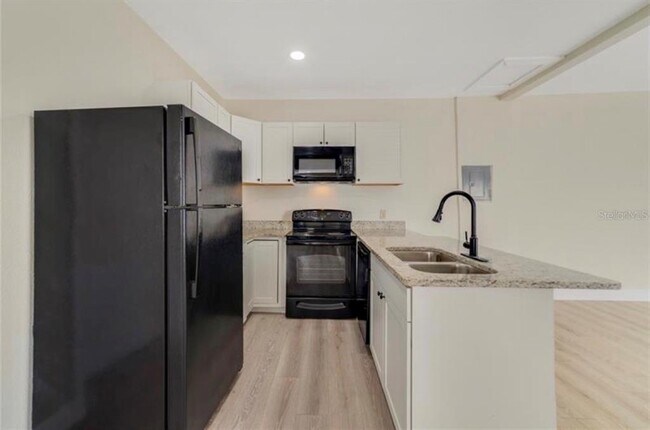 Building Photo - 222 N Orlando Ave