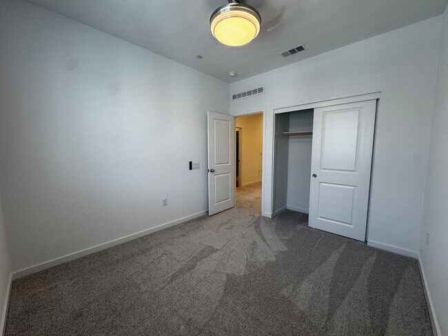 Building Photo - Beautiful, New Siena 3 Bedroom, 2.5 Bath Townhome with Solar for Rent
