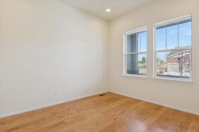 Building Photo - Modern 4-Bed Ranch in Erie with 13-Ft Ceilings, Solar Panels & EV Charger