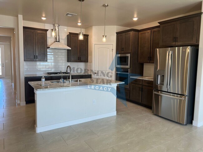 Building Photo - Stunning 2025-built rental in highly desirable Sonoma Ranch — 4 bed / 3 bath