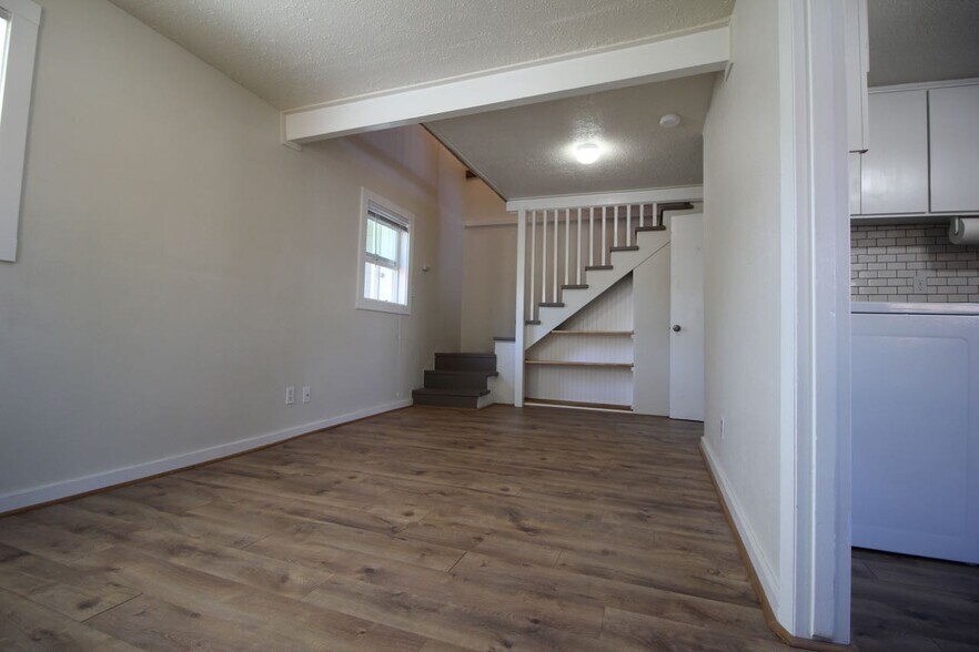 living room with built in bookcase and closet - 210 Northeast 5th Avenue