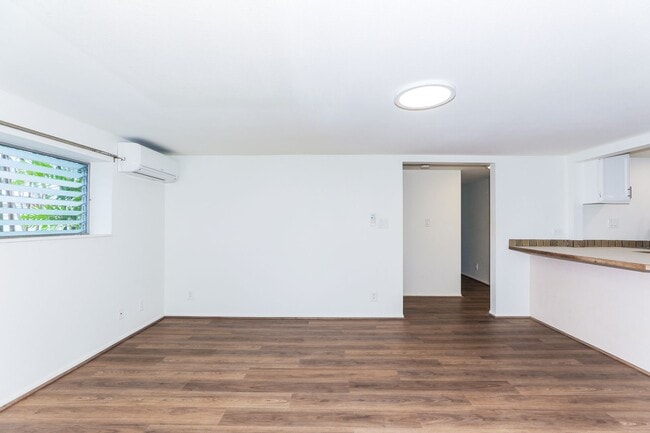 Building Photo - Kahala Avenue Beachside - remodeled 2 bedroom, 1 bath with Luxury Vinyl Plank Flooring