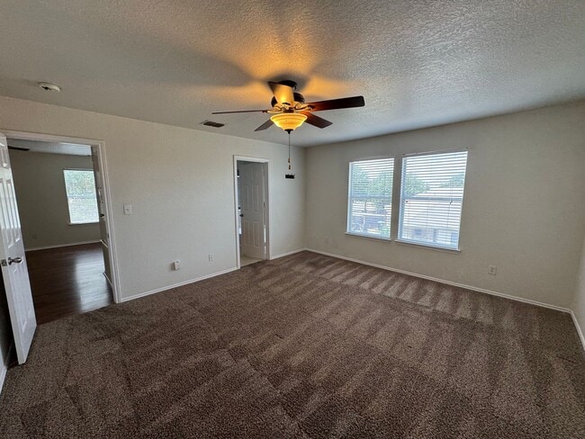 Building Photo - CUTE 2-STORY NESTLED ON A CUL-DE-SAC FEATURING AN ISLAND KITCHEN WITH STOVE/RANGE, DISHWASHER, MI...