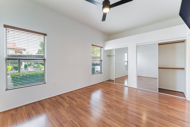Building Photo - Charming Ground-Floor Condo with Wood Flooring & Modern Comforts!
