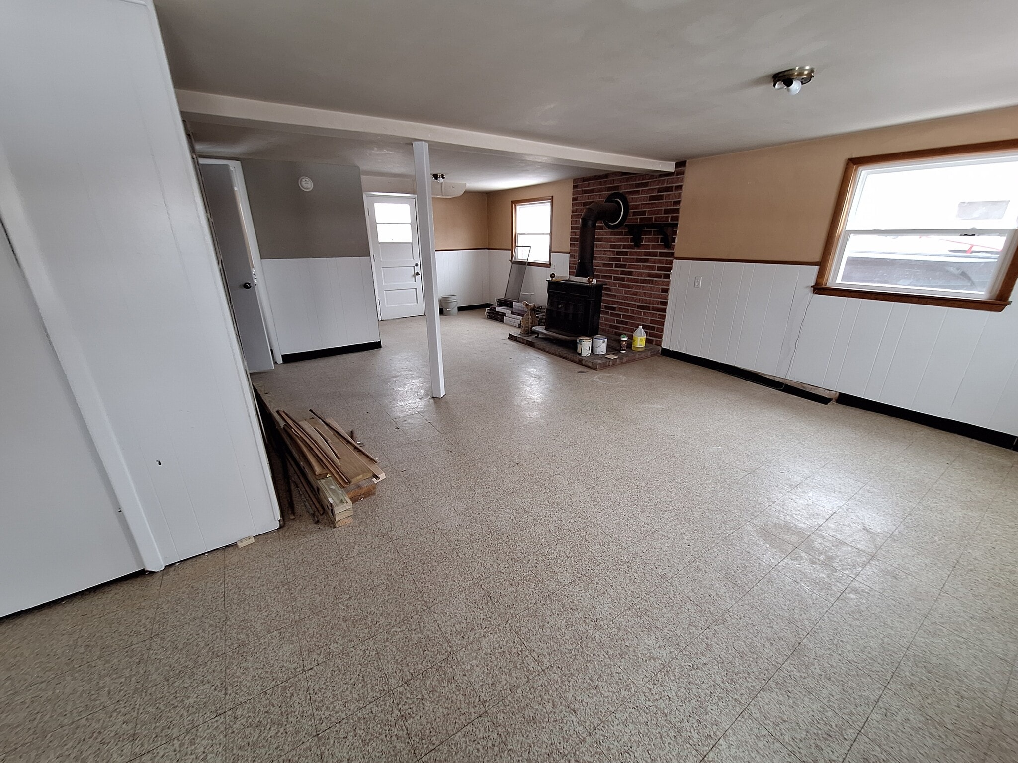 Lower level access to laundry, 1/2 bath and back door - 4113 Wooded Way