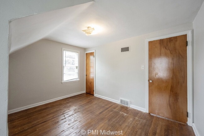Building Photo - "Charming 2-Bedroom Duplex with Gleaming Hardwood Floors in Indy!"