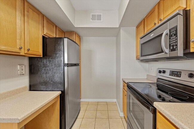 Building Photo - Updated 2/2 unit becoming available for an...