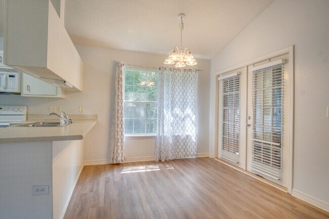 Building Photo - Northeast Pensacola 2 R, 2BA Home Near UWF with Wood-Look Flooring, Large Sunroom, Spacious Lot &...
