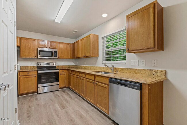 Building Photo - Earn Wealth While Leasing - Like a Homeown...