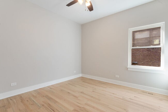 Building Photo - 6410 S Vernon Ave