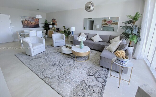 Building Photo - 10275 Collins Ave