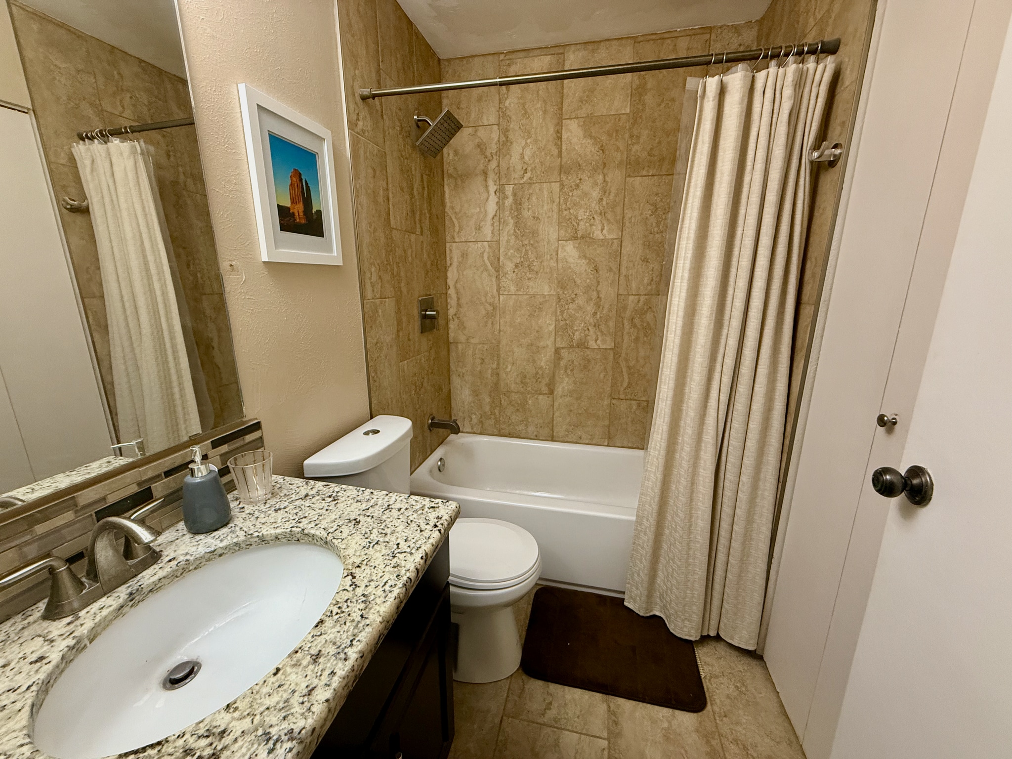 Bathroom with full tub. - 960 N Pennsylvania St