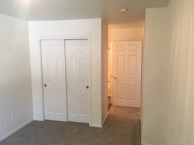 Partial bedroom 2," the bedrooms are nice and big. "not shown here". - 2709 Wildwood Cir