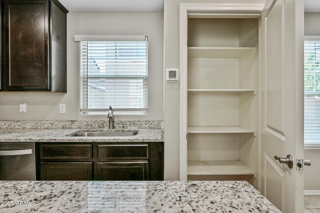 Building Photo - 8047 W Albeniz Pl