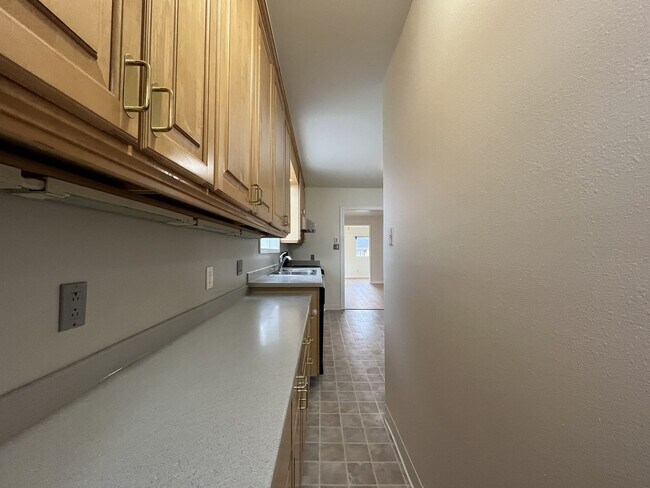 Building Photo - Character-Filled Concordia Home with Flexible Living Spaces & Gas Fireplace