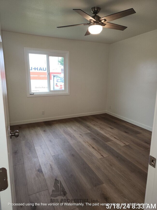 Building Photo - Welcome to this stunning 4-bedroom, 3-bath...