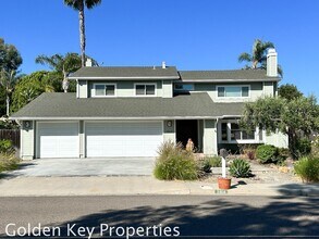 Building Photo - Welcome to this stunning 4-bedroom, 2.5-ba...