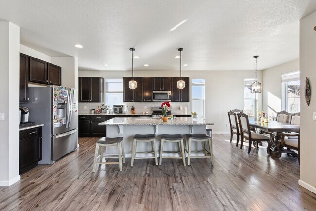 Building Photo - Check out this fantastic home nestled in the highly desirable Candelas community - Available Sept...