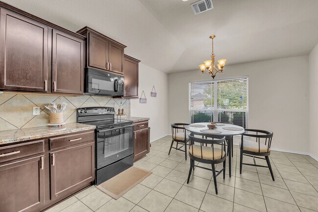 Building Photo - 4 bedroom/2 bath/2 Car Garage - Beautiful ...