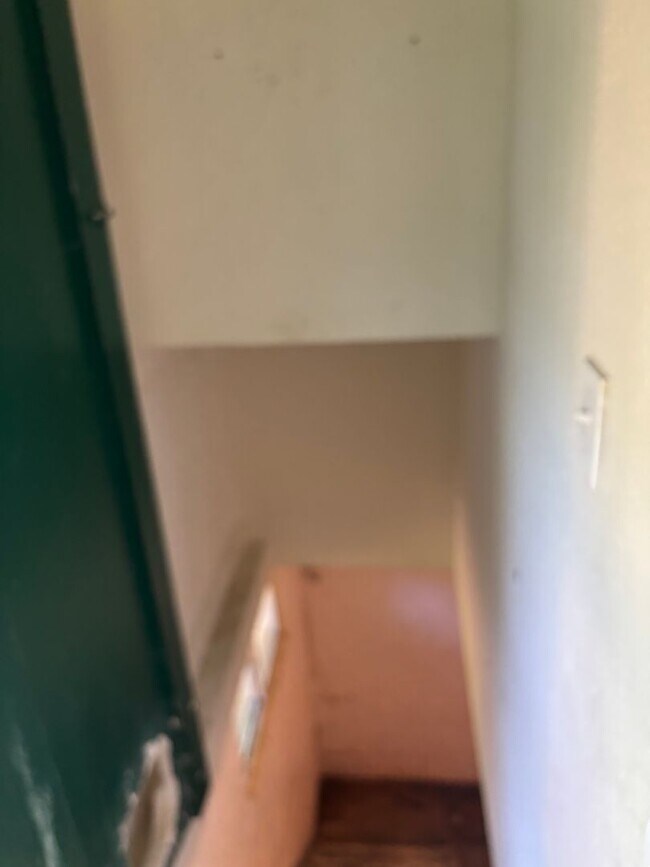 Building Photo - Perfect Home for You and Your Pup! Dog House Included + Fenced Yard