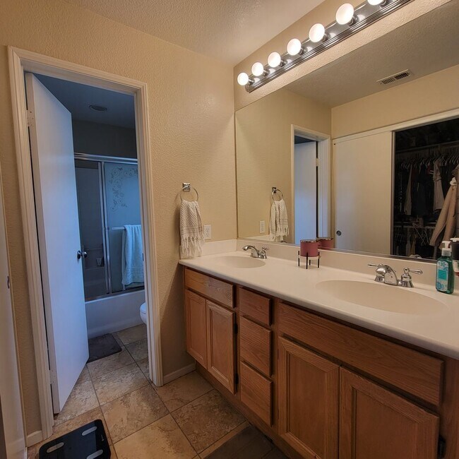 Building Photo - MOVE-IN SPECIAL $500 OFF! Otay Ranch - Gorgeous 2 Bed/2 Bath Condo with Garage