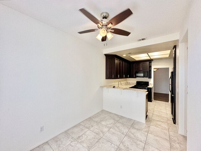 Building Photo - Beautiful Upstairs Condo Unit in the Priva...