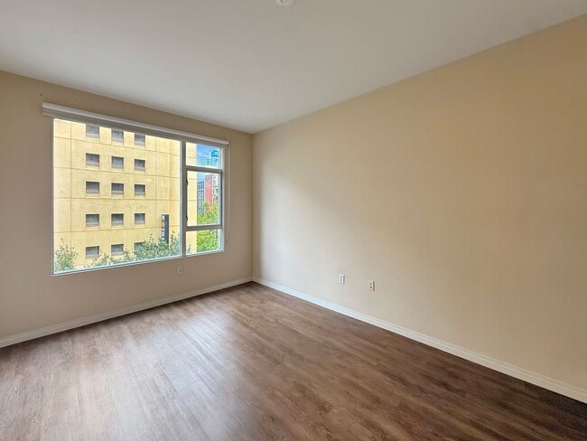 Building Photo - Newly Remodeled 2B/2BA condo w/ Reserved P...