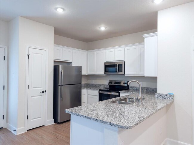 Building Photo - 13837 Enzo Gate