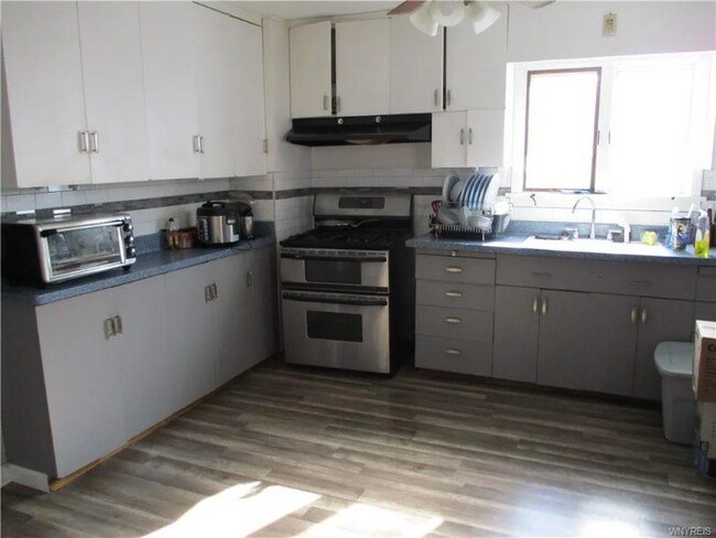 Building Photo - 3465 Walden Ave