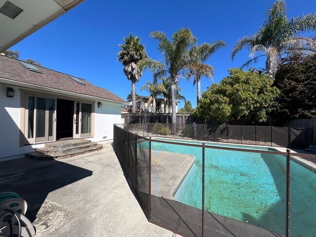 Building Photo - Spacious 4-Bedroom Retreat Just Steps from...