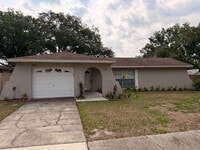 Building Photo - "Discover Your Oasis: Stylish 3-Bed, 2-Bath Home with Granite Touches & Private Pool in Tampa!"