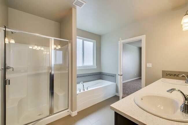 Building Photo - Close to Micron!  5 Bedroom 3 Full Baths -...