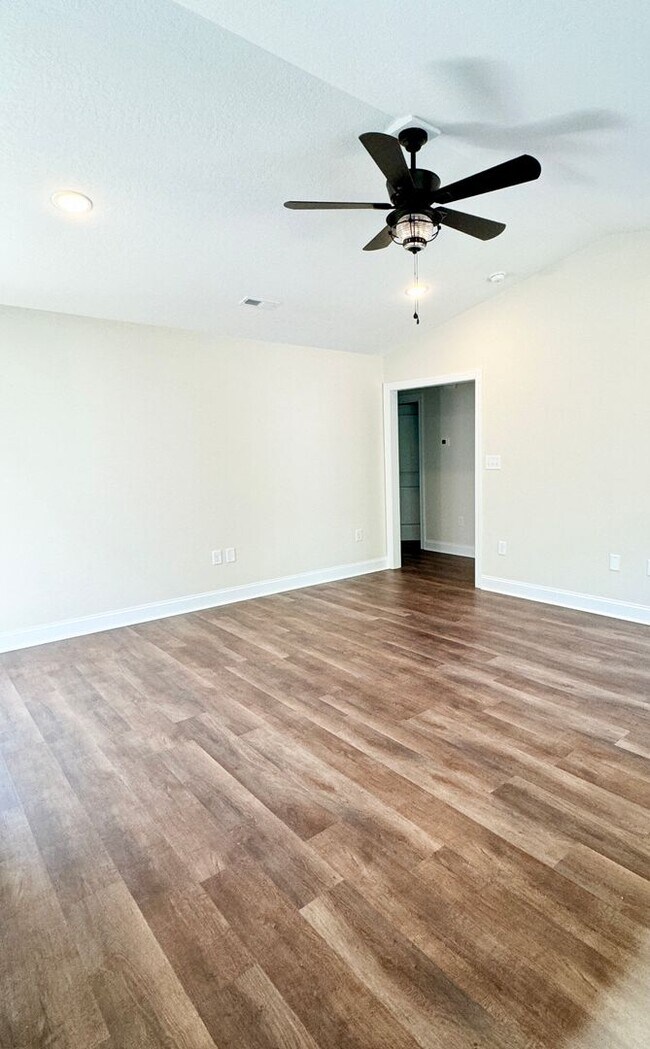 Building Photo - BEAUTIFUL pond front home! All the details make this a showstopper.! Fenced Yard!!