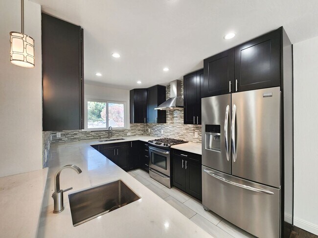 Building Photo - 3 bedroom 3 bathroom hillside Pacifica home with serene views