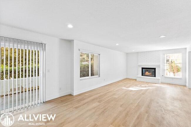 Building Photo - Upgraded 3 Bedroom Townhome in the Gated C...