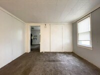 Building Photo - Fall into this cozy 3-Bedroom Home with a ...