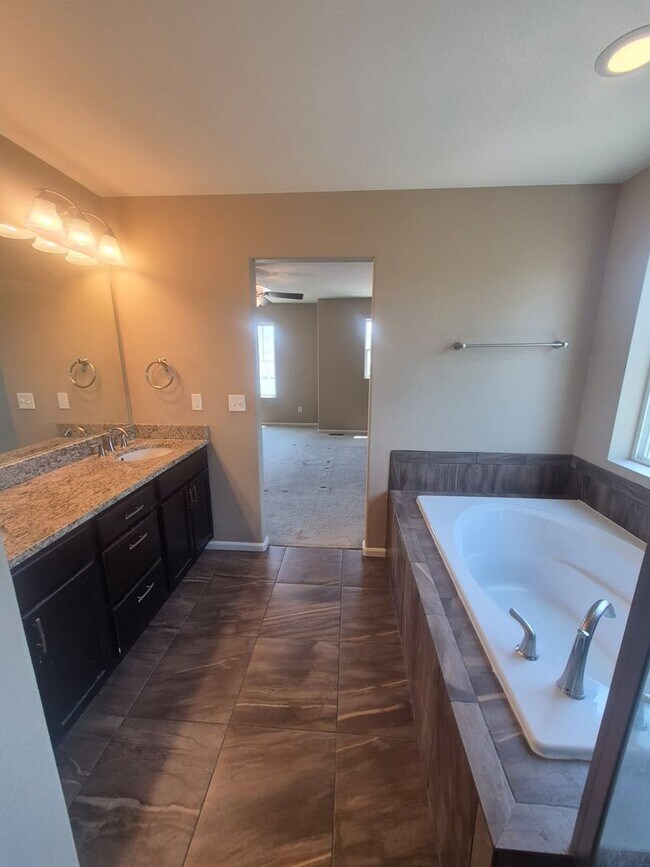 Building Photo - Spacious 5-Bed Home in Banning Lewis Ranch – Mountain Views