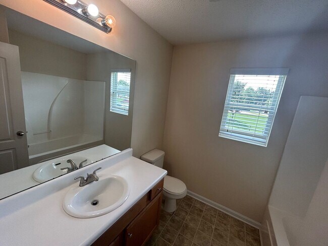 Building Photo - PRE-LEASING FOR AUGUST 2025! 1/2 OFF SECUR...
