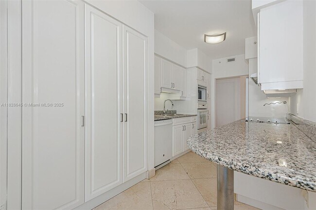 Building Photo - 4779 Collins Ave