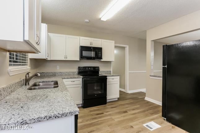 Building Photo - 3 br, 2 bath House - 5909 R Caribbean Ct N